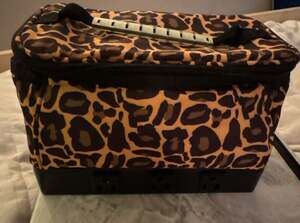 Leopard Print travel bag with six charging ports